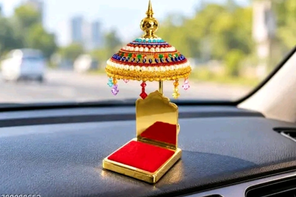 Golden Chhatra Jhula displayed on a car dashboard