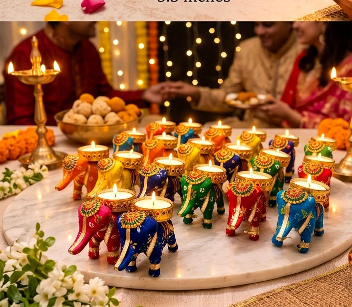 Festive display of colourful Rajasthani-style elephant tea-light holders arranged on a table