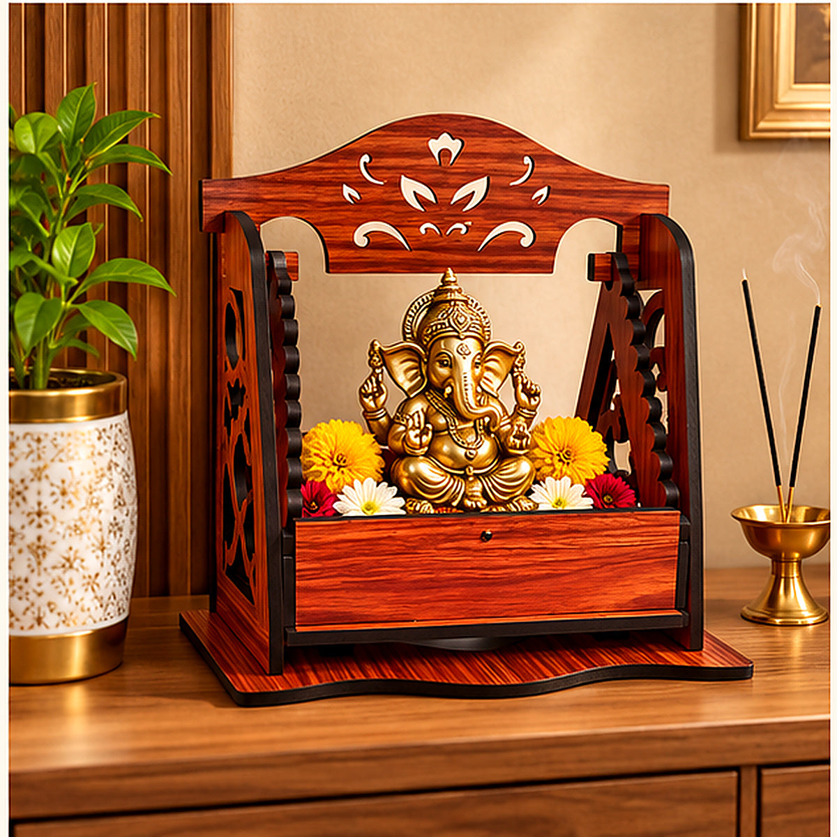 Lifestyle photograph of a deity jhula styled in a home mandir with an idol and flowers
