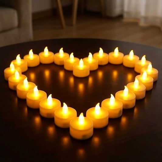 24-piece warm glow flameless LED diya set arranged in a heart