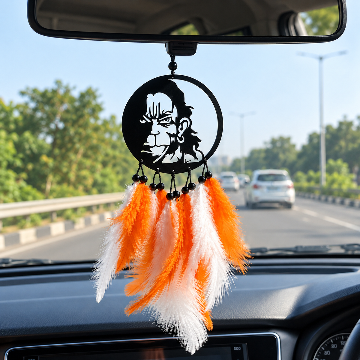 Shri Hanuman face car hanging with orange and white feathers – product image