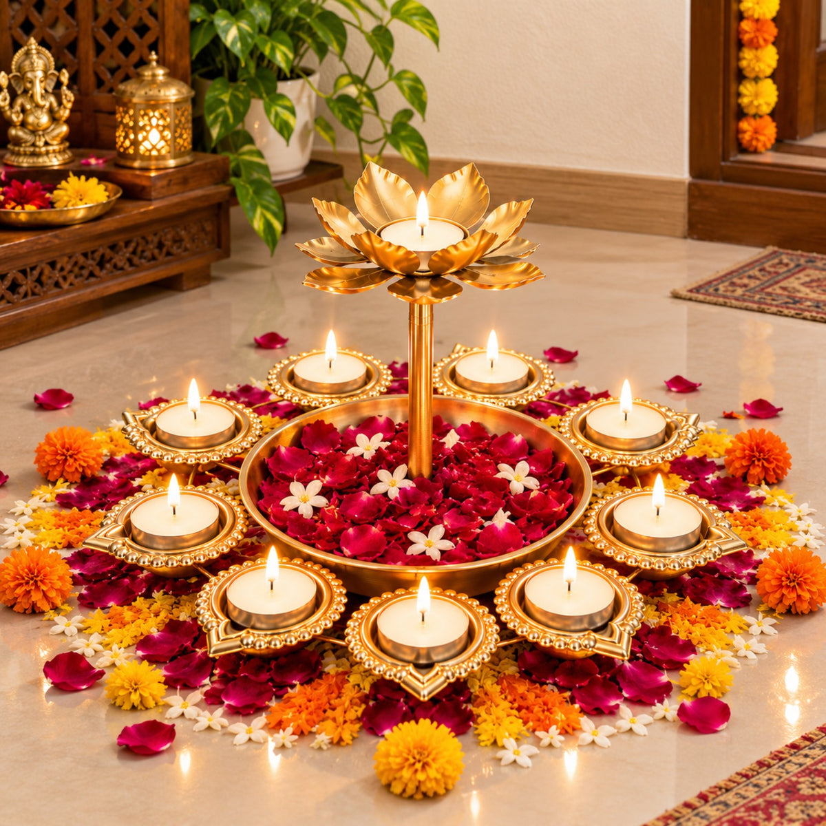 Decorative gold lotus diya centerpiece arranged with flowers in a traditional home pooja setting