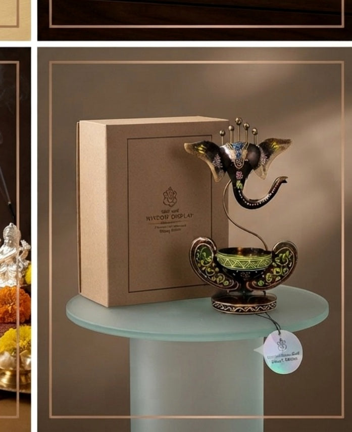 Decorative Ganesha tea-light holder shown with its gift-style presentation