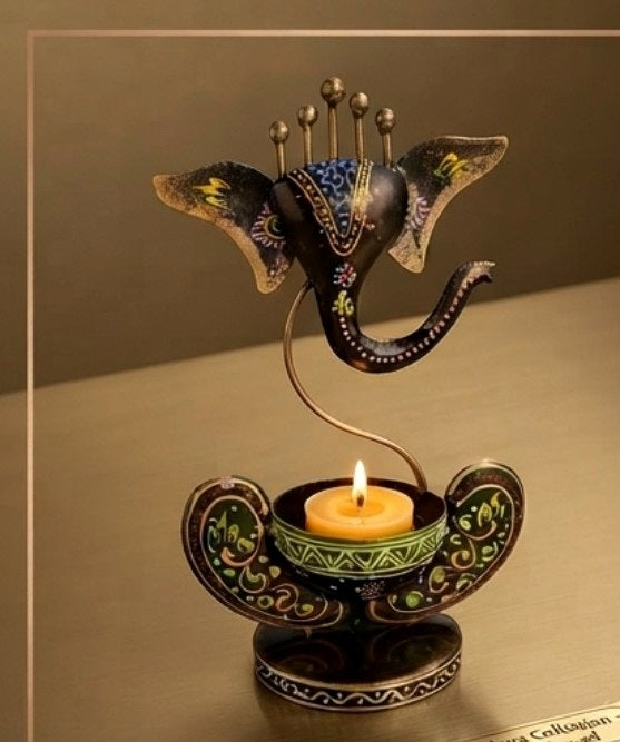Main product image of a decorative Lord Ganesha tea-light holder with a painted bowl and curved display stem