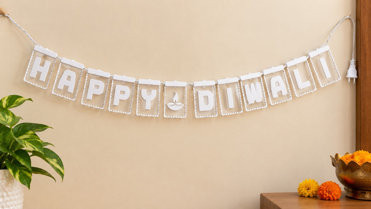 Happy Diwali light-up letter banner displayed across a wall as festive home decoration