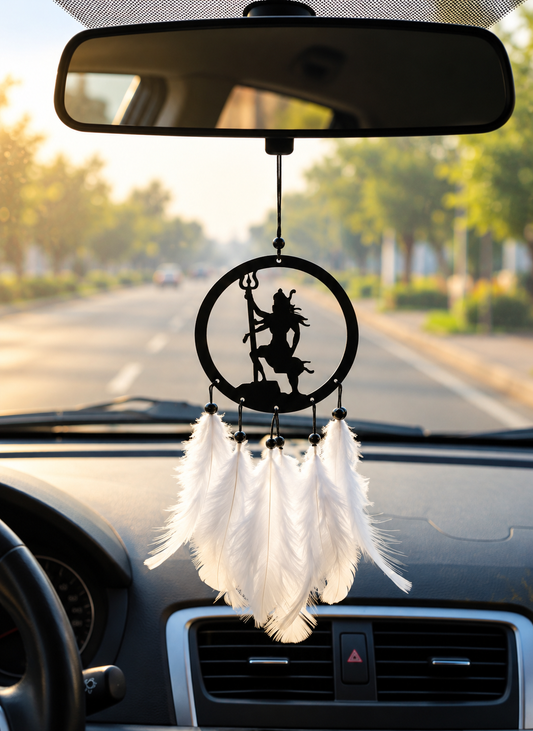 Lord Shiva car hanging with white feather tassels, shown beneath the rear-view mirror
