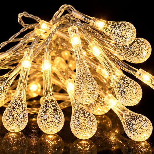 Warm white raindrop LED string lights close-up product view